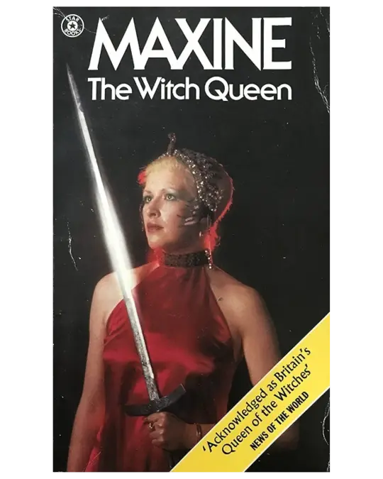 Cover of Maxine the Witch Queen: a blonde woman in a red halter dress and a beaded headdress holds a sword upright.